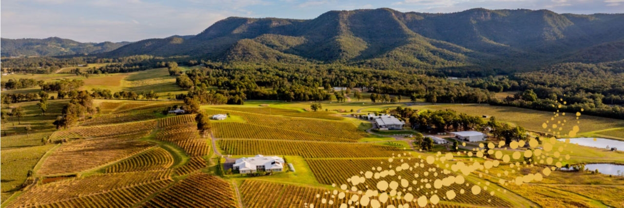 Australian farmland with hills in the background