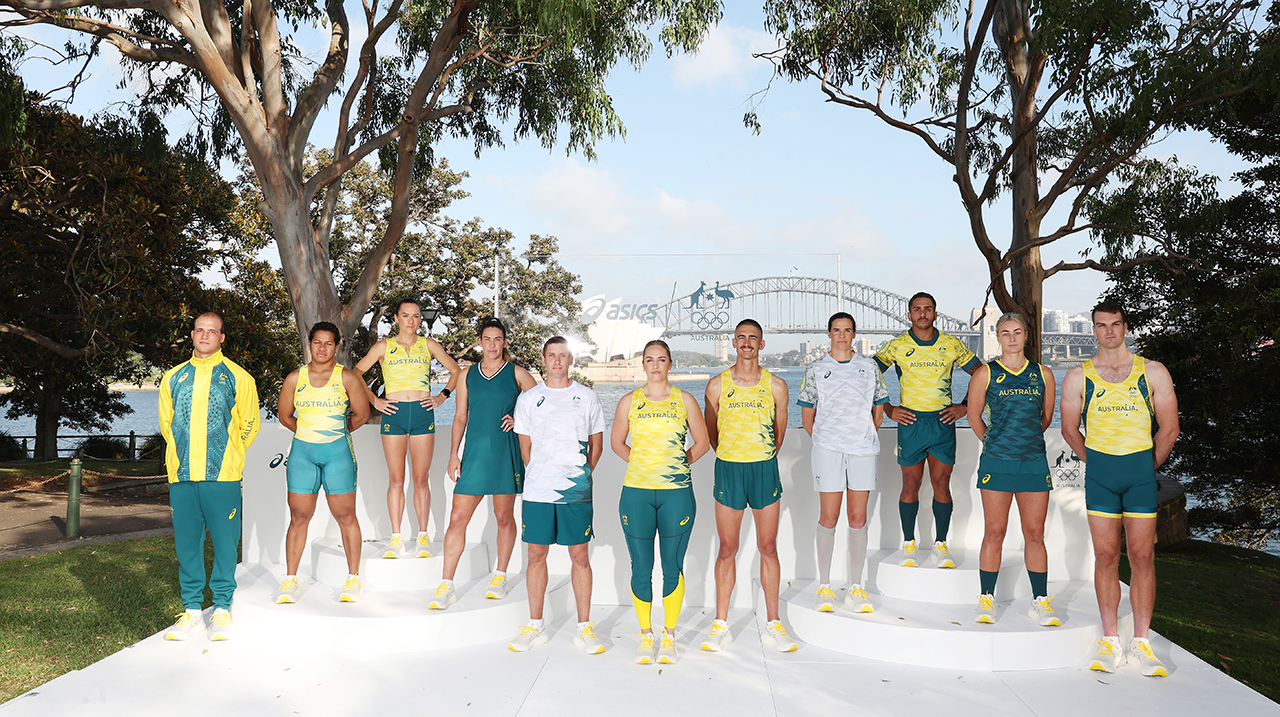 A group of athletes pose in Australian Olympic uniforms